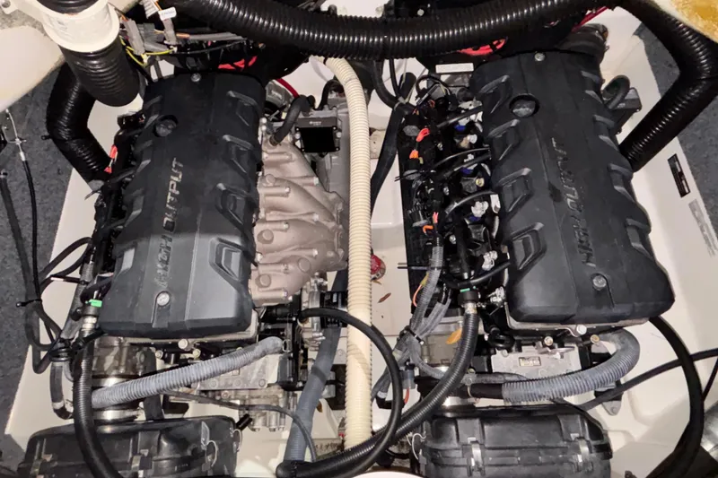 Slide: The Image of Engine compartment of a 2016 Yamaha Boats 242 Limited S, showcasing dual high-output engines. - 17