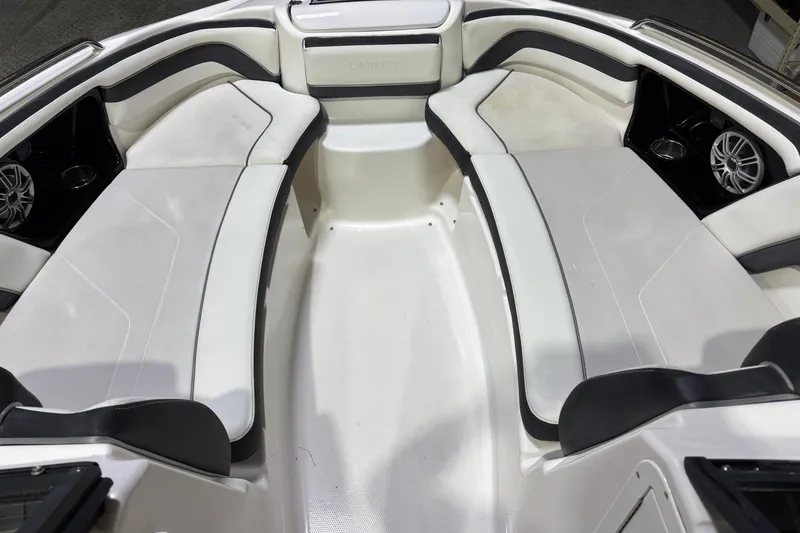 Slide: The Image of Interior of 2016 Yamaha Boats 242 Limited S, featuring spacious seating and sleek design. - 8