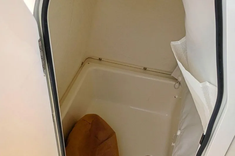 Slide: The Image of Interior storage compartment of 2026 Pioneer 202 Sportfish boat. - 15