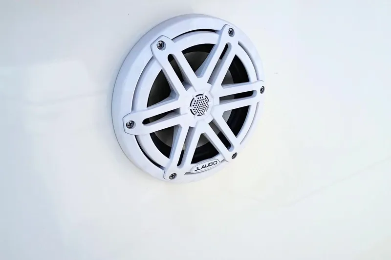 Slide: The Image of White JL Audio speaker on 2026 Pioneer 202 Sportfish boat. - 24