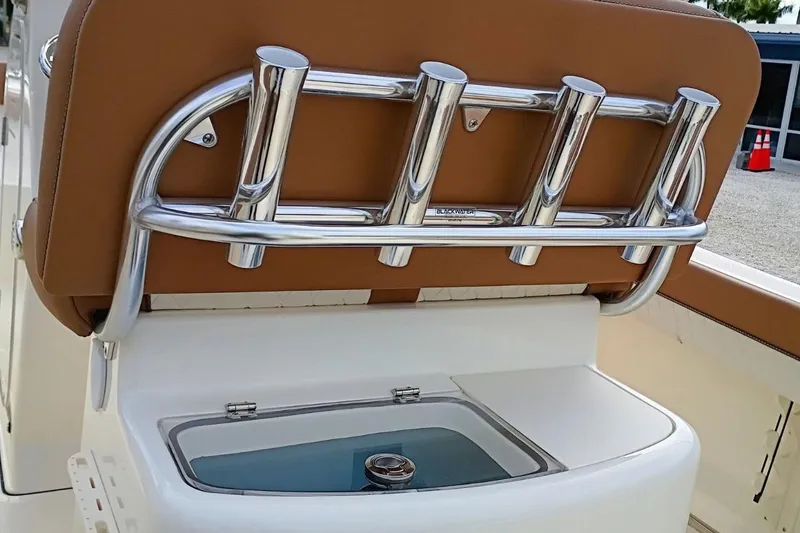 Slide: The Image of 2026 Pioneer 202 Sportfish boat with rod holders and livewell. - 6