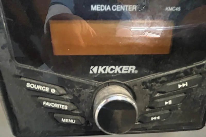 Slide: The Image of 2023 Sun Tracker Party Barge 18 DLX pontoon boat with Mercury outboard motor on trailer. - 11