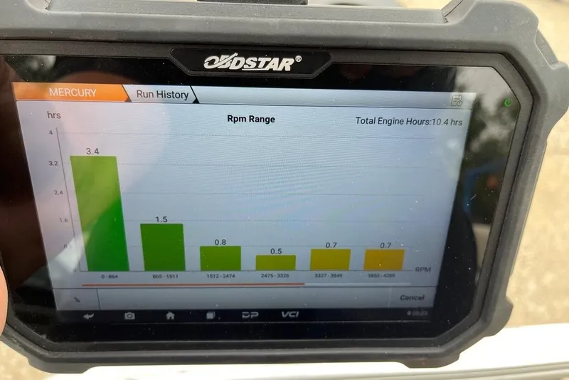 Slide: The Image of 2023 Sun Tracker Party Barge 18 DLX pontoon boat on trailer, parked on roadside. - 15