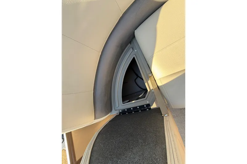 Slide: The Image of 2023 Sun Tracker Party Barge 18 DLX interior storage compartment detail. - 37