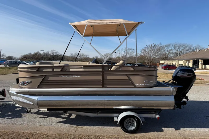 Slide: The Image of 2023 Sun Tracker Party Barge 18 DLX pontoon boat with Mercury outboard motor. - 56