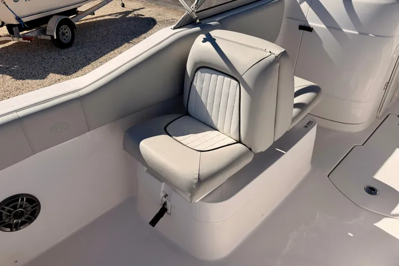 Slide: The Image of 2023 Sea Fox 228 Traveler boat seat with gray upholstery and sleek design. - 23
