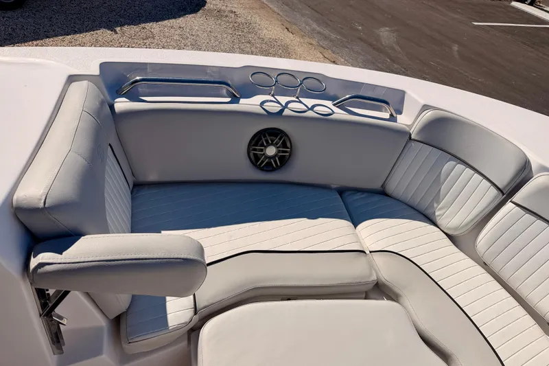 Slide: The Image of 2023 Sea Fox 228 Traveler boat interior with cushioned seating and cup holders. - 25