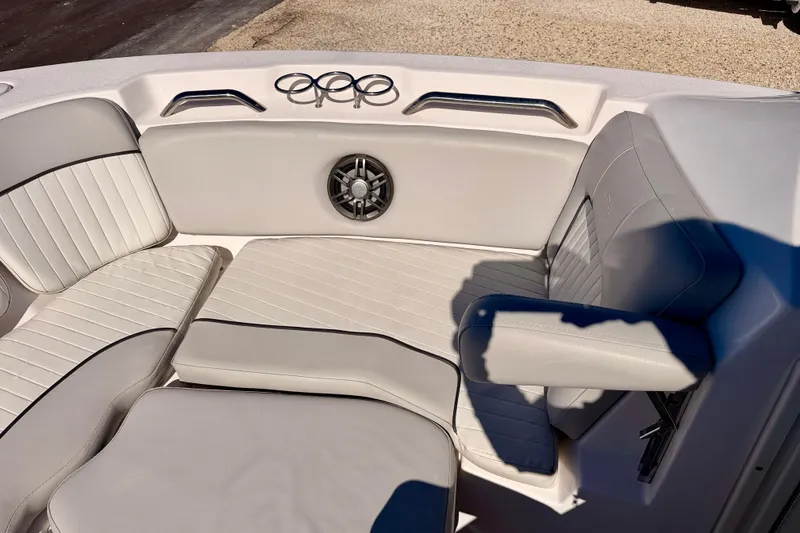 Slide: The Image of 2023 Sea Fox 228 Traveler boat interior with cushioned seating and speaker. - 26