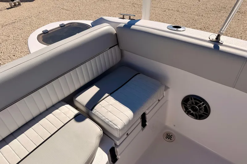 Slide: The Image of 2023 Sea Fox 228 Traveler boat interior with cushioned seating and speaker. - 30