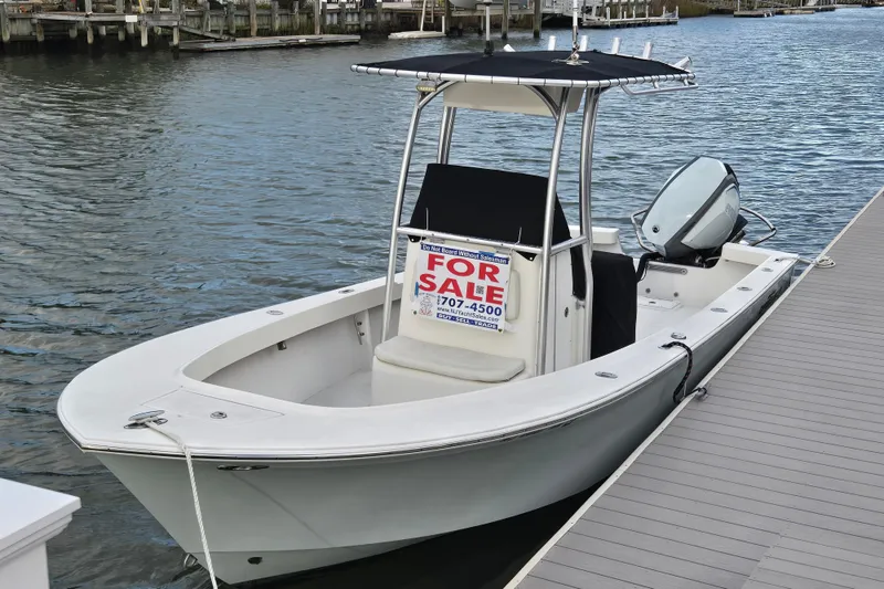 Slide: The Image of 2020 May-Craft 23 Cape Classic boat for sale docked by the water. - 17