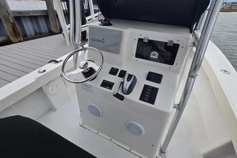 Slide: The Image of 2020 May-Craft 23 Cape Classic boat console with Garmin navigation system. - 2