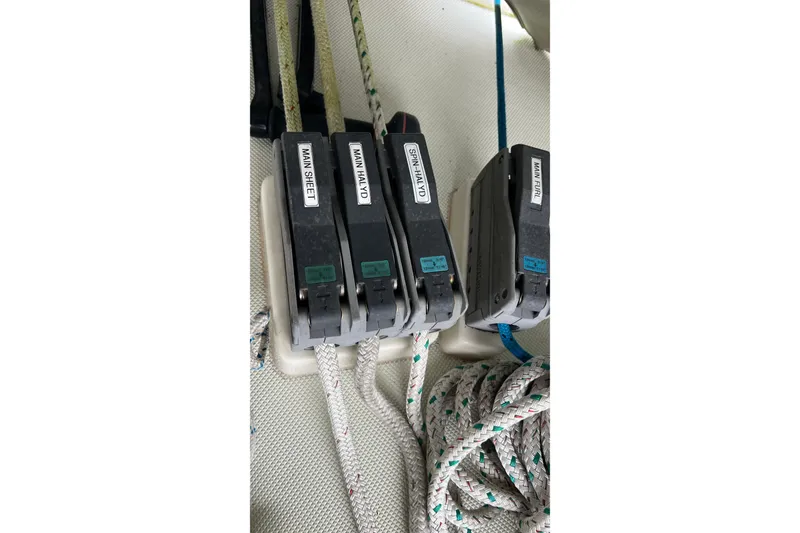Slide: The Image of Rope clutches on a 2006 Tayana Cutter sailboat deck. - 21