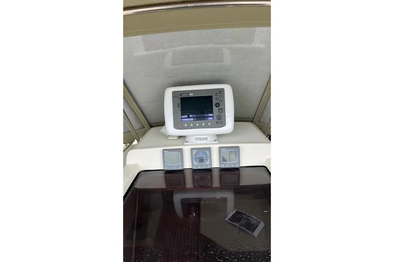 Slide: The Image of Navigation equipment on 2006 Tayana Cutter sailboat dashboard. - 24