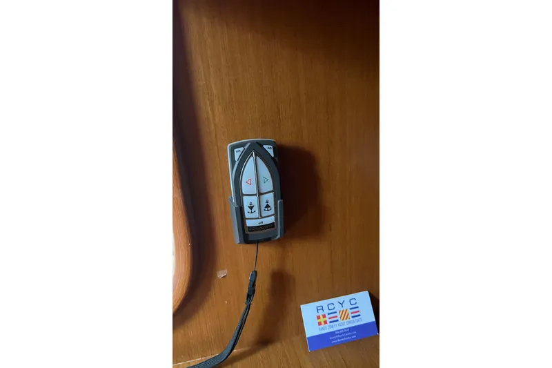 Slide: The Image of Remote control mounted on wooden panel in 2006 Tayana Cutter yacht. - 25