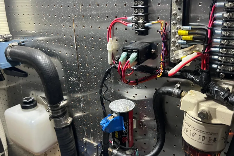 Slide: The Image of Engine room wiring and components of a 2006 Tayana Cutter yacht. - 28