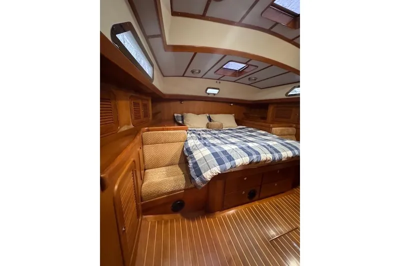 Slide: The Image of Luxurious 2006 Tayana Deck Salon interior with cozy bed and wooden finish. - 5