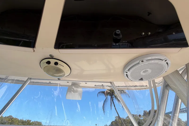 Slide: The Image of 2006 Grady-White Sailfish 282 boat interior with speaker and control panel. - 113