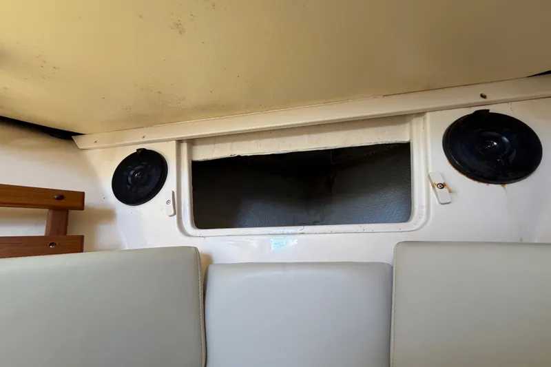Slide: The Image of Interior of 2006 Grady-White Sailfish 282 boat with speakers and seating. - 133