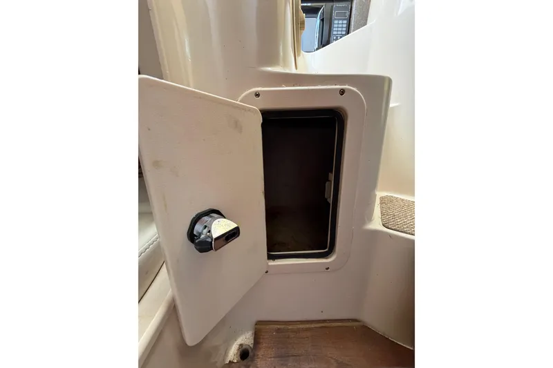 Slide: The Image of Open storage compartment on 2006 Grady-White Sailfish 282 boat. - 158