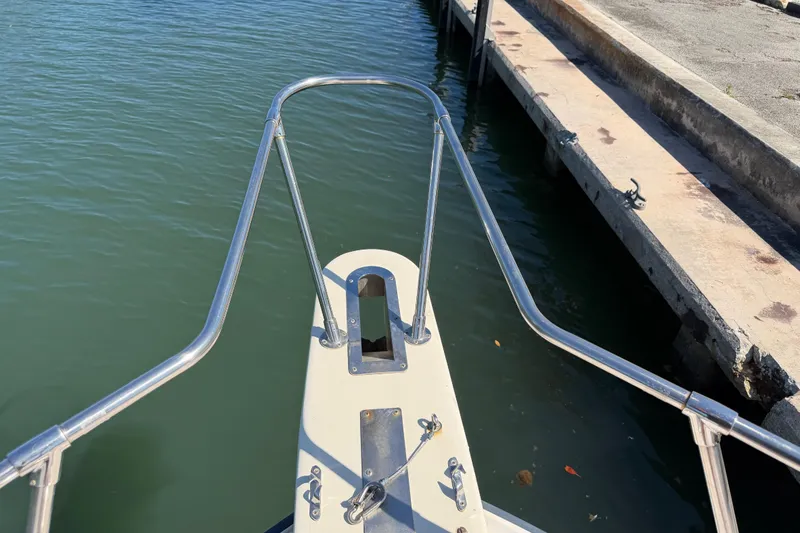 Slide: The Image of Bow of 2006 Grady-White Sailfish 282 boat docked at marina. - 172