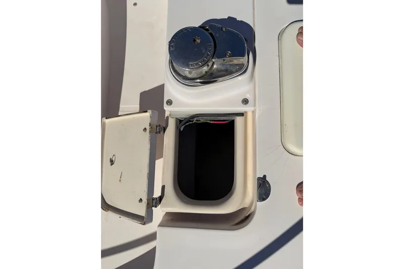 Slide: The Image of 2006 Grady-White Sailfish 282 boat deck with open storage compartment. - 176