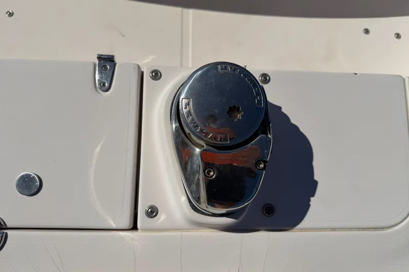 Slide: The Image of Close-up of a 2006 Grady-White Sailfish 282 boat's chrome deck fitting. - 177