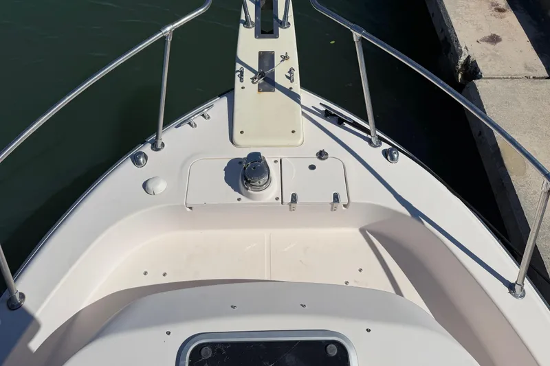 Slide: The Image of Bow of 2006 Grady-White Sailfish 282 boat docked at marina. - 182