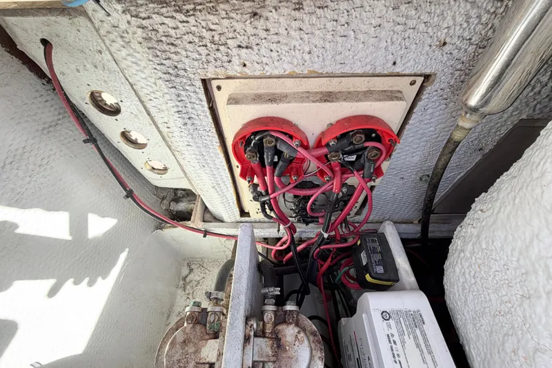 Slide: The Image of Electrical wiring and battery setup in a 2006 Grady-White Sailfish 282 boat. - 199