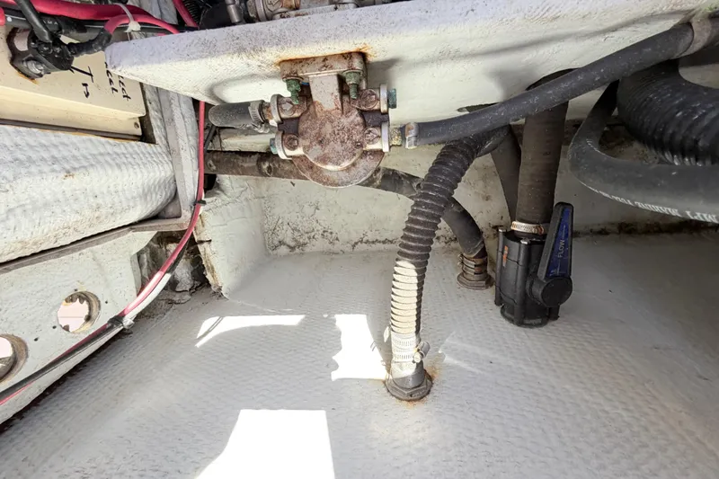 Slide: The Image of 2006 Grady-White Sailfish 282 boat interior showing mechanical components and wiring. - 202