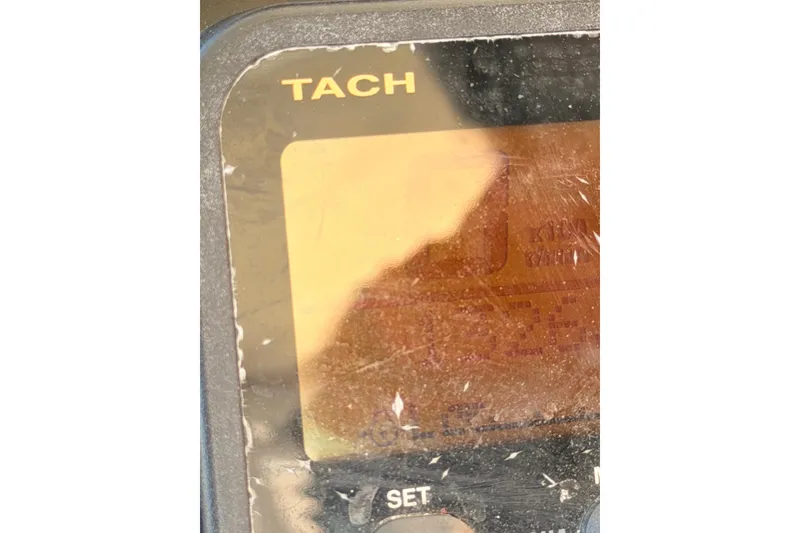Slide: The Image of Close-up of a tachometer on a 2006 Grady-White Sailfish 282 boat. - 207