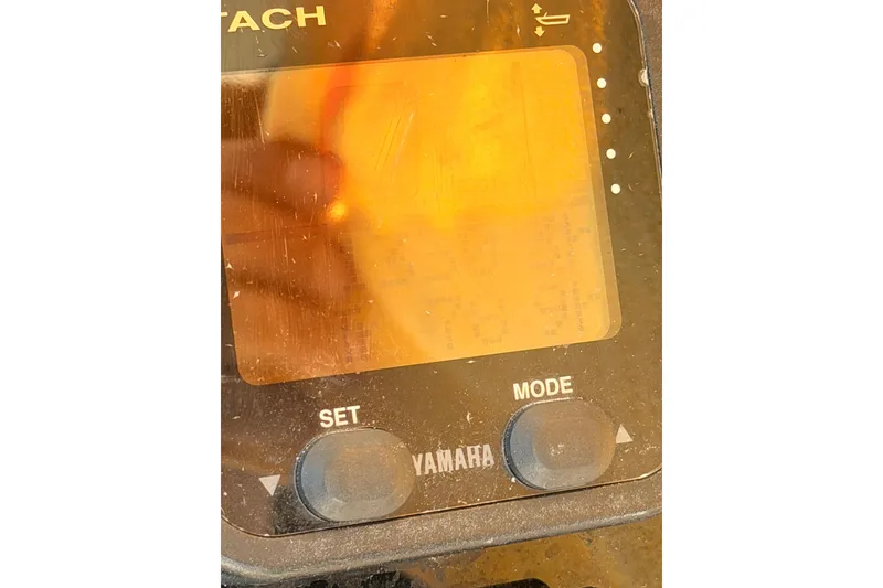 Slide: The Image of Close-up of a Yamaha boat control panel on a 2006 Grady-White Sailfish 282. - 208