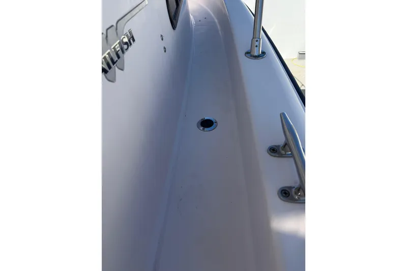 Slide: The Image of 2006 Grady-White Sailfish 282 boat deck with cleat and railing detail. - 35