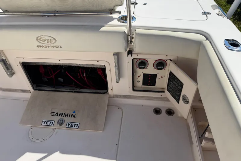 Slide: The Image of 2006 Grady-White Sailfish 282 boat dashboard with Garmin and Yeti accessories. - 36