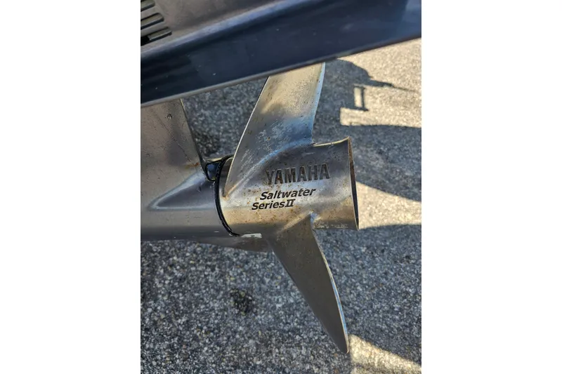 Slide: The Image of 2006 Grady-White Sailfish 282 boat with dual Yamaha engines on a trailer. - 4