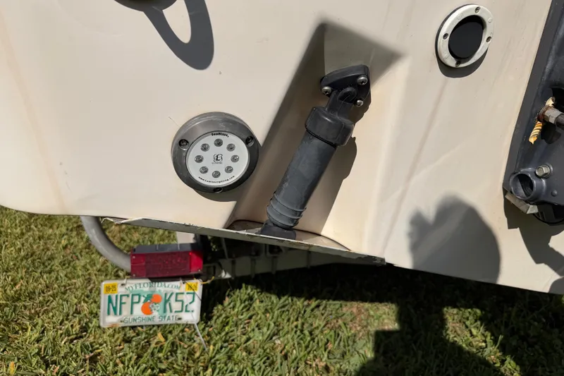 Slide: The Image of 2006 Grady-White Sailfish 282 boat stern with Florida license plate and underwater light. - 45