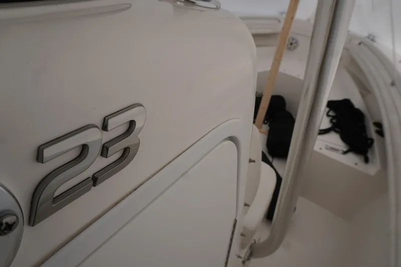 Slide: The Image of 2018 Regulator 23 boat interior with model number detail. - 12
