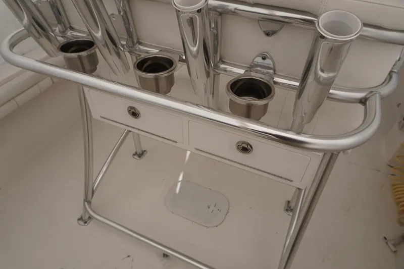 Slide: The Image of Stainless steel rod holders and storage on 2018 Regulator 23 boat. - 15