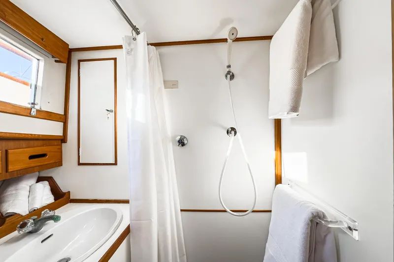Slide: The Image of Bathroom of 1984 Grand Banks 42 Classic yacht with shower and sink. - 48