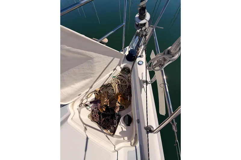 Slide: The Image of Deck of 1996 Hunter 336 sailboat with ropes and equipment. - 21