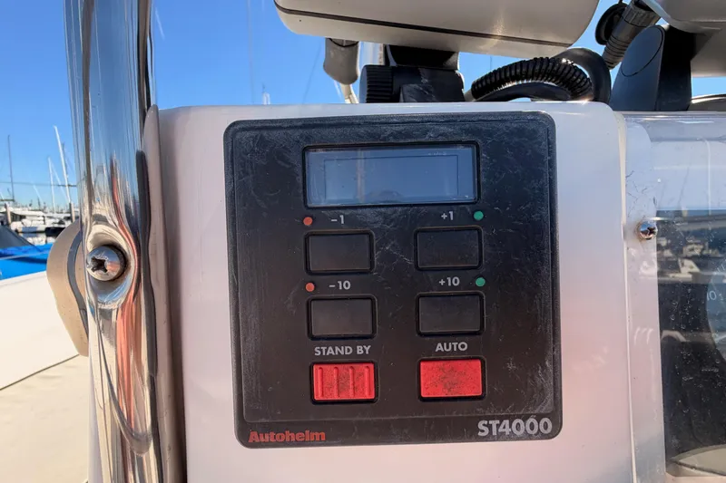 Slide: The Image of Autopilot control panel on a 1996 Hunter 336 sailboat, featuring Autohelm ST4000. - 8