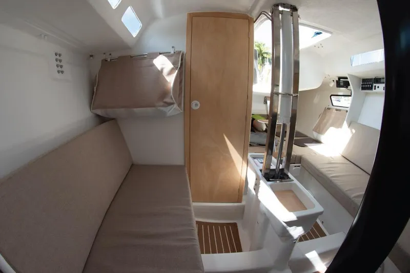 Slide: The Image of Interior of 2025 Zonda Yachts Z28, featuring modern seating and sleek design elements. - 11