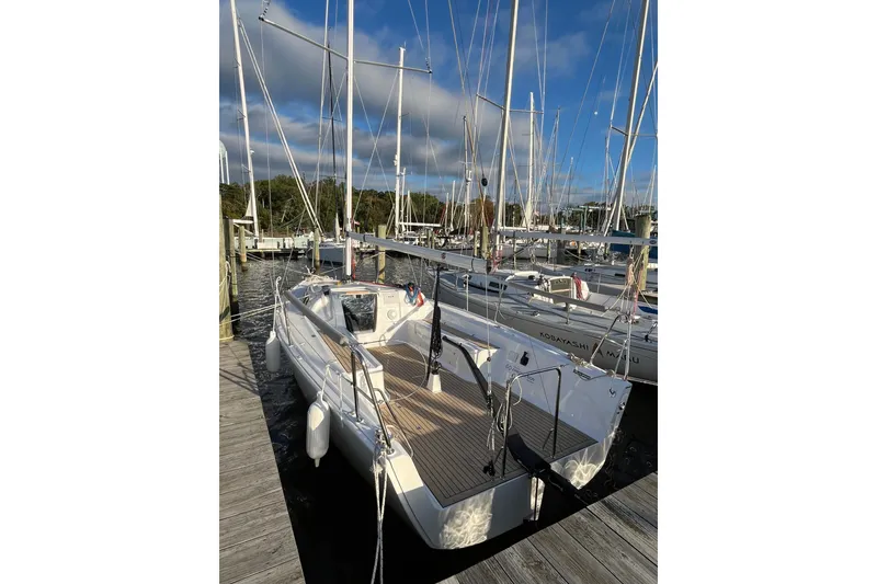 Slide: The Image of 2025 Zonda Yachts Z28 docked at marina, showcasing sleek design and modern features. - 22