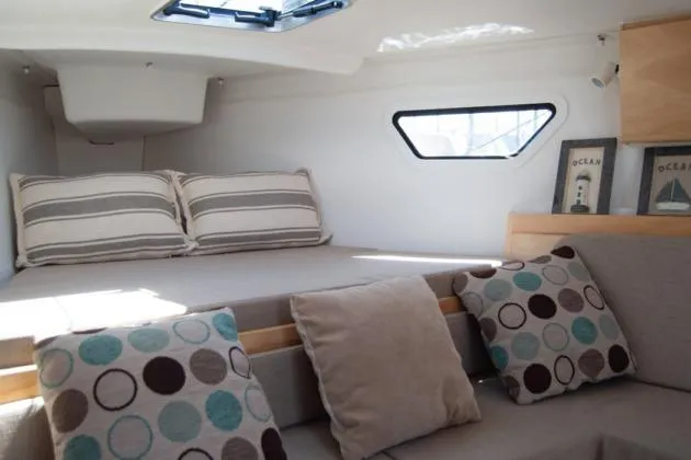 Slide: The Image of Luxurious interior of 2025 Zonda Yachts Z28 with stylish cushions and modern decor. - 5