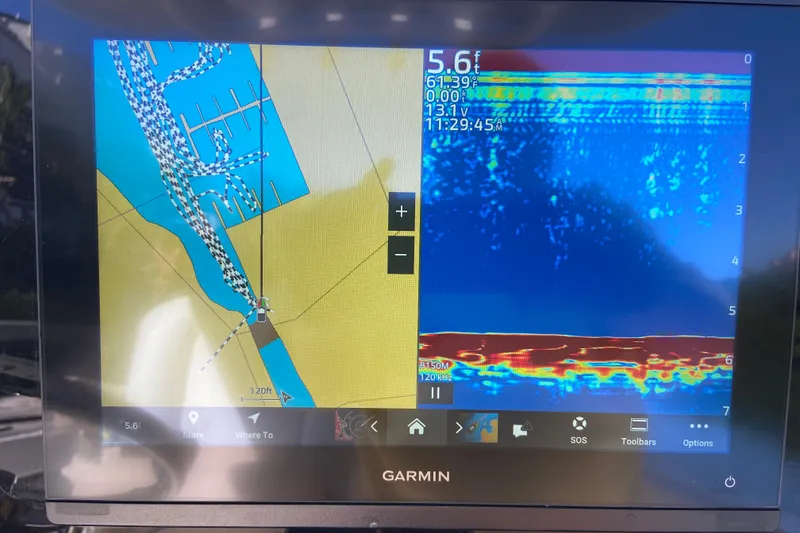 Slide: The Image of Garmin marine navigation display on 2023 Sea Hunt Gamefish 27 Forward Seating boat. - 13