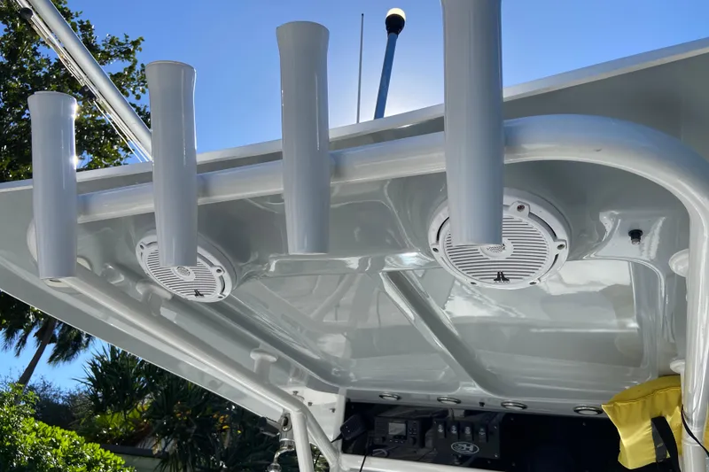 Slide: The Image of 2023 Sea Hunt Gamefish 27 boat roof with rod holders and speakers. - 21