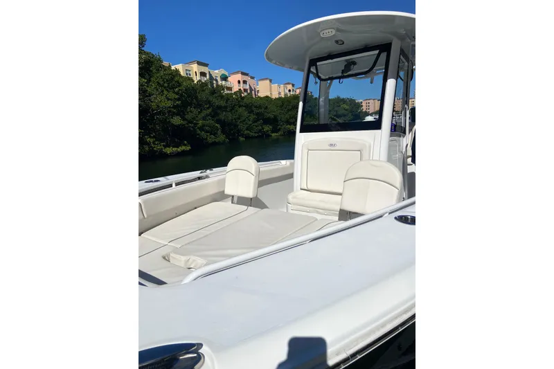 Slide: The Image of 2023 Sea Hunt Gamefish 27 Forward Seating boat with sleek design and comfortable seating. - 9