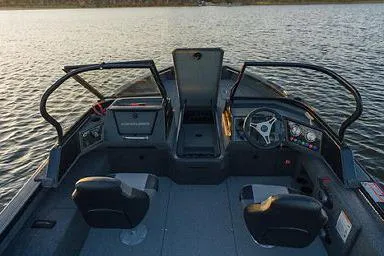 Slide: The Image of Manufacturer Provided Image: 2026 Crestliner 2050 Fish Hawk boat interior on calm water. - 2