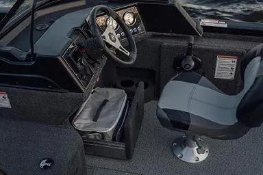 Slide: The Image of Manufacturer Provided Image: 2026 Crestliner 2050 Fish Hawk boat interior with steering wheel and seating. - 3