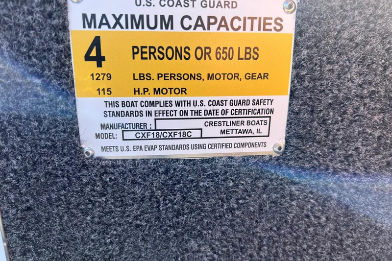 Slide: The Image of Capacity label for Crestliner XF 189, 2026 model, 4 persons or 650 lbs, 115 HP motor. - 12