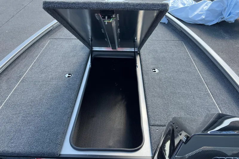 Slide: The Image of Open storage compartment on 2026 Crestliner XF 189 boat deck. - 4